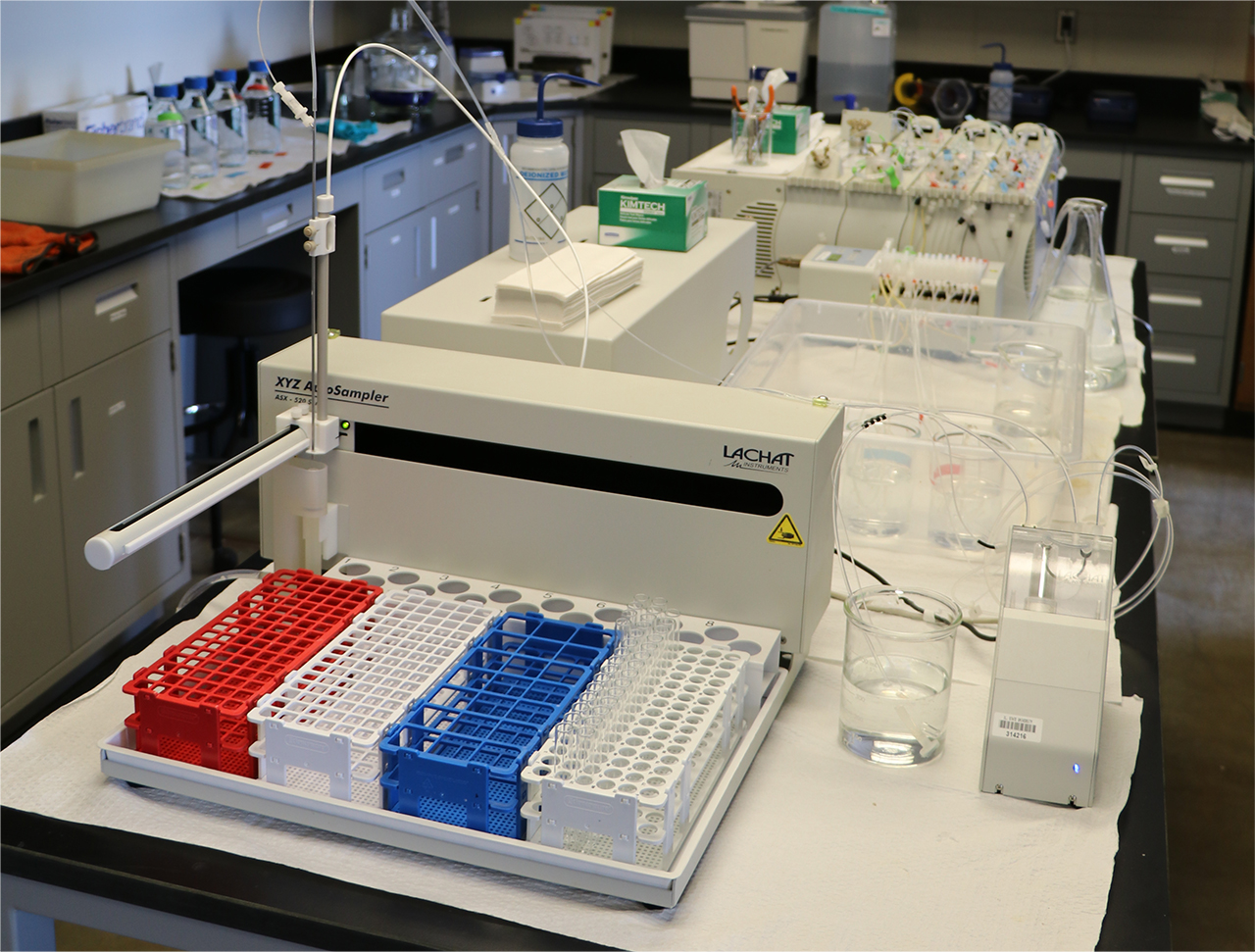 Test tubes, and equipment line a table in the Laboratory for Environmental Analysis