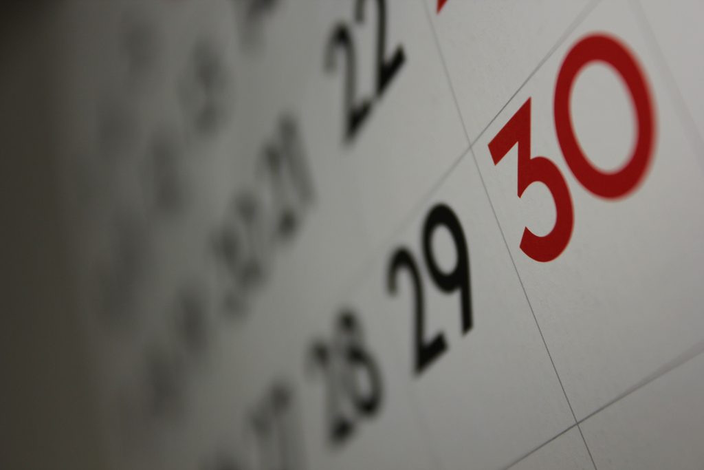 close-up of a calendar, so some dates are clear and others blurry