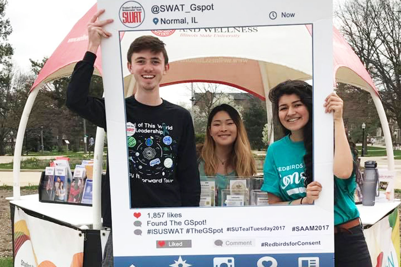 Students posing with Instagram frame from Consent Day 2017