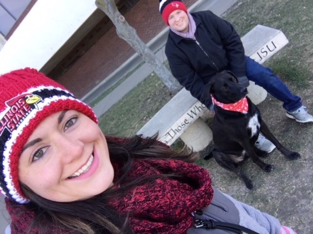 Morgan and Chris Smith at the love bench with their dog
