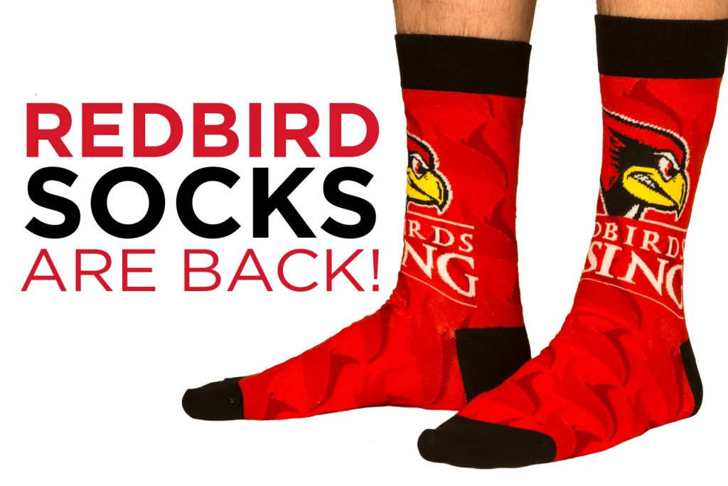 photo of someone's feet wearing socks featuring the Redbirds Rising logo.