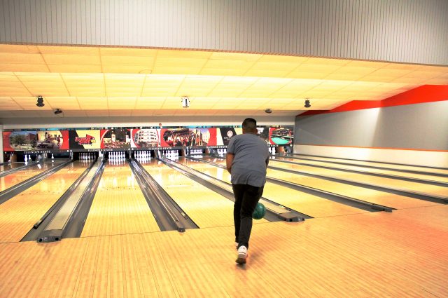 An Illinois State student bowls at Sunday Funday.