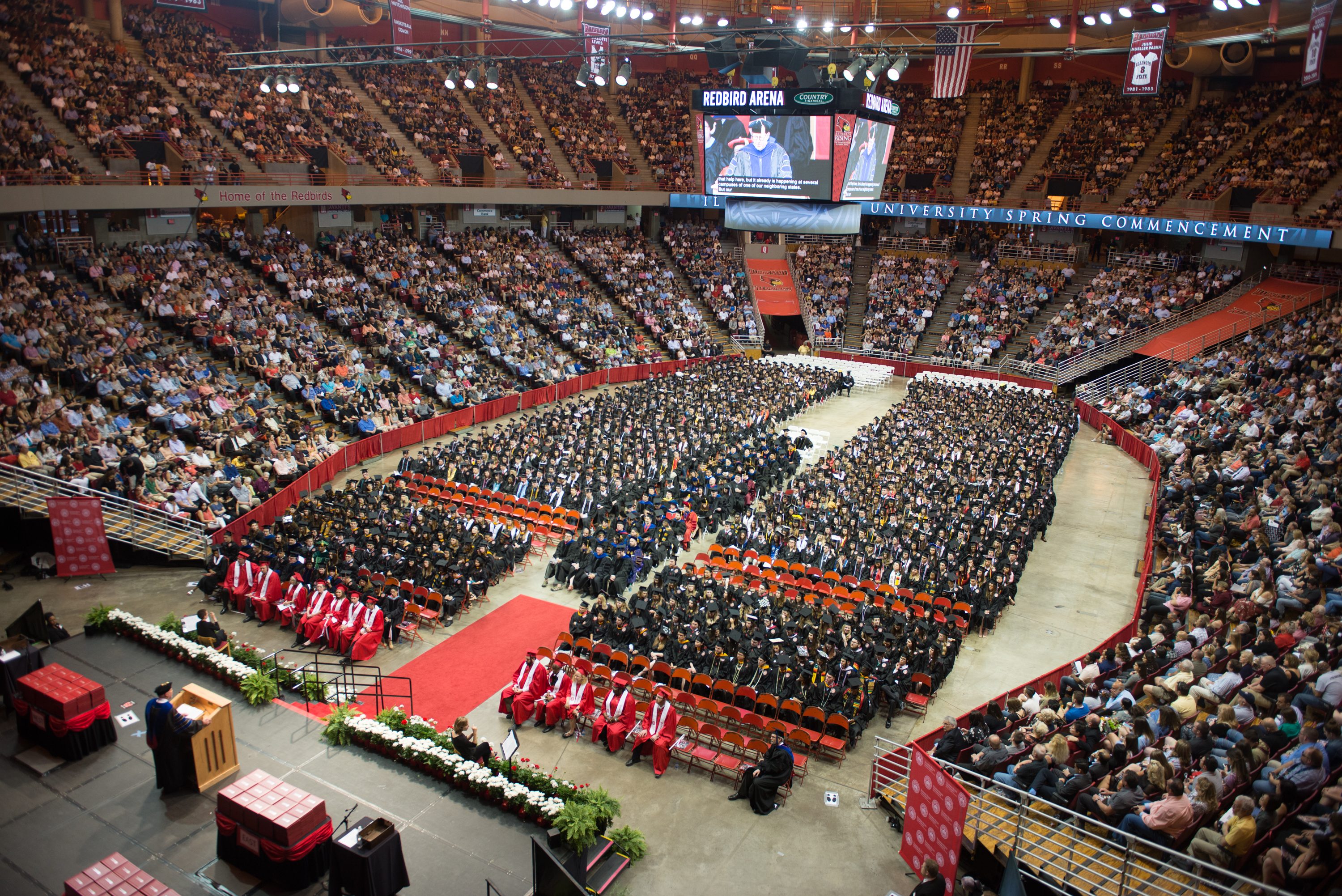 A view of the filled Redbird Arena from high in the stands at Commencement