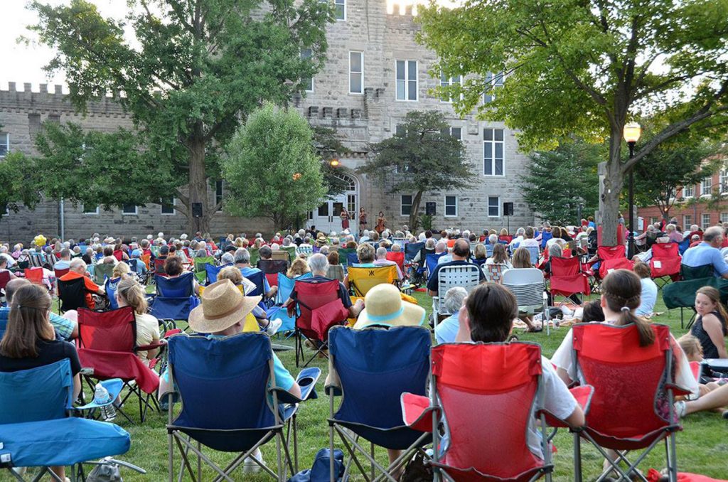 Image of people enjoying a concert as part of the Concerts on the Quad series