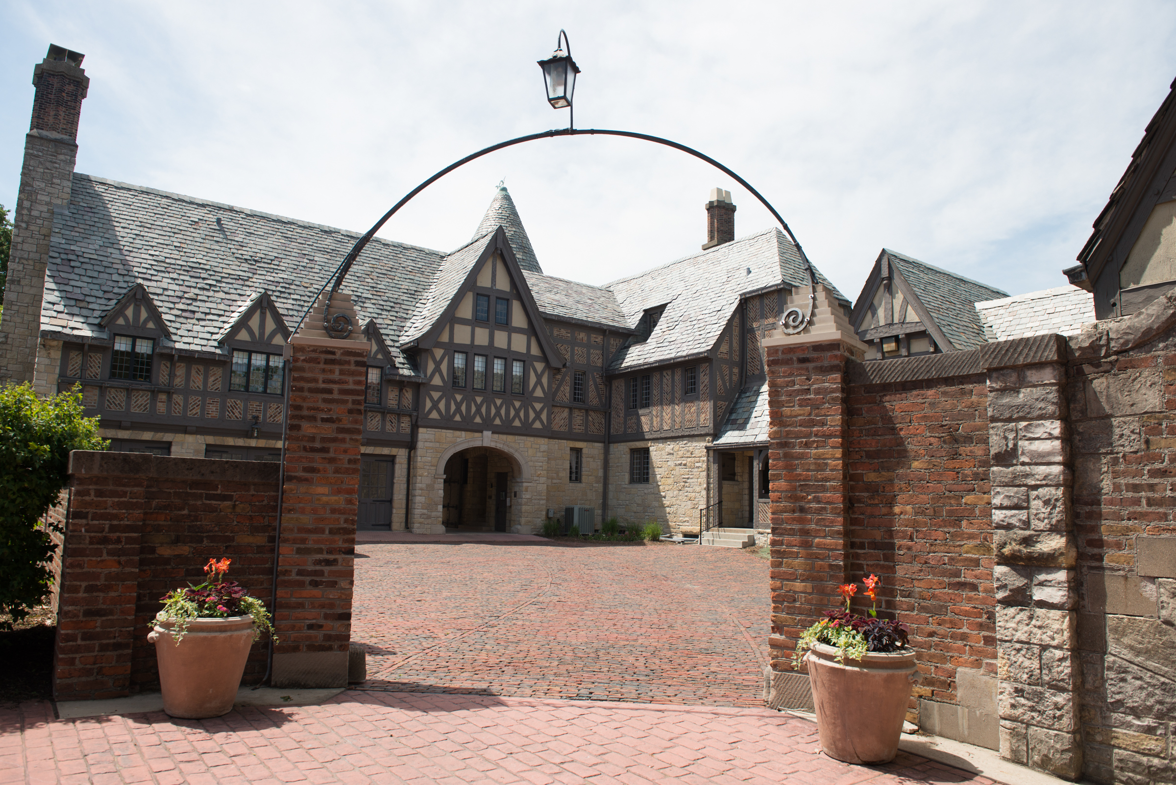 brick-lined path and patios in front of Ewing Manor