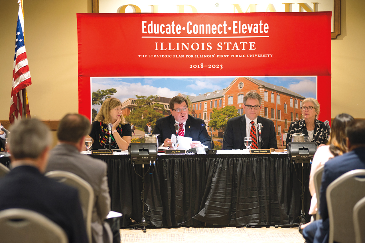 President Larry Dietz (second from left) and the Board of Trustees at the spring meeting where the board approved the University's new strategic plan.