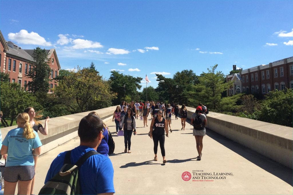 Students on campus bridge