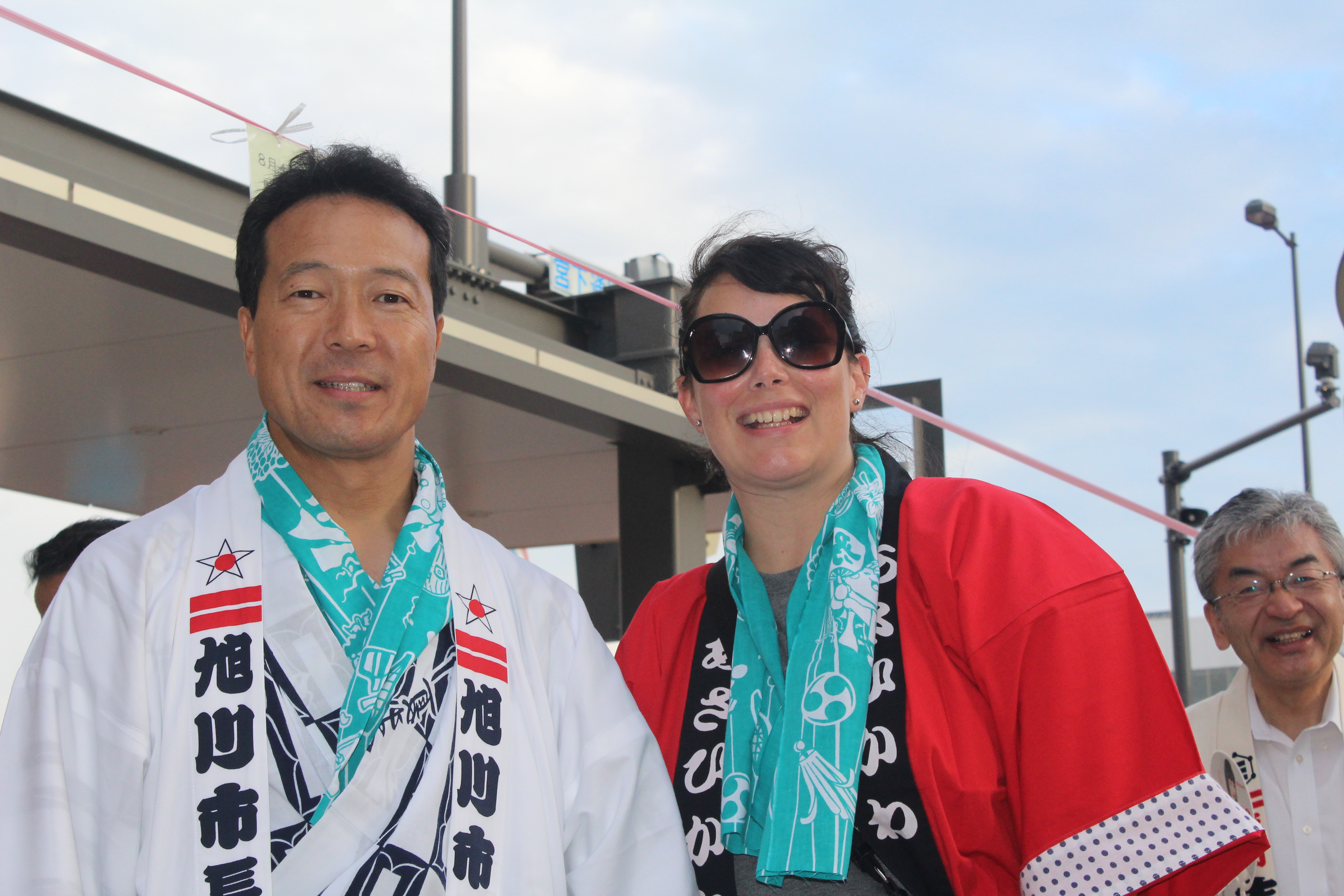 Harriett Steinbach poses with the mayor of Asahikawa, Japan