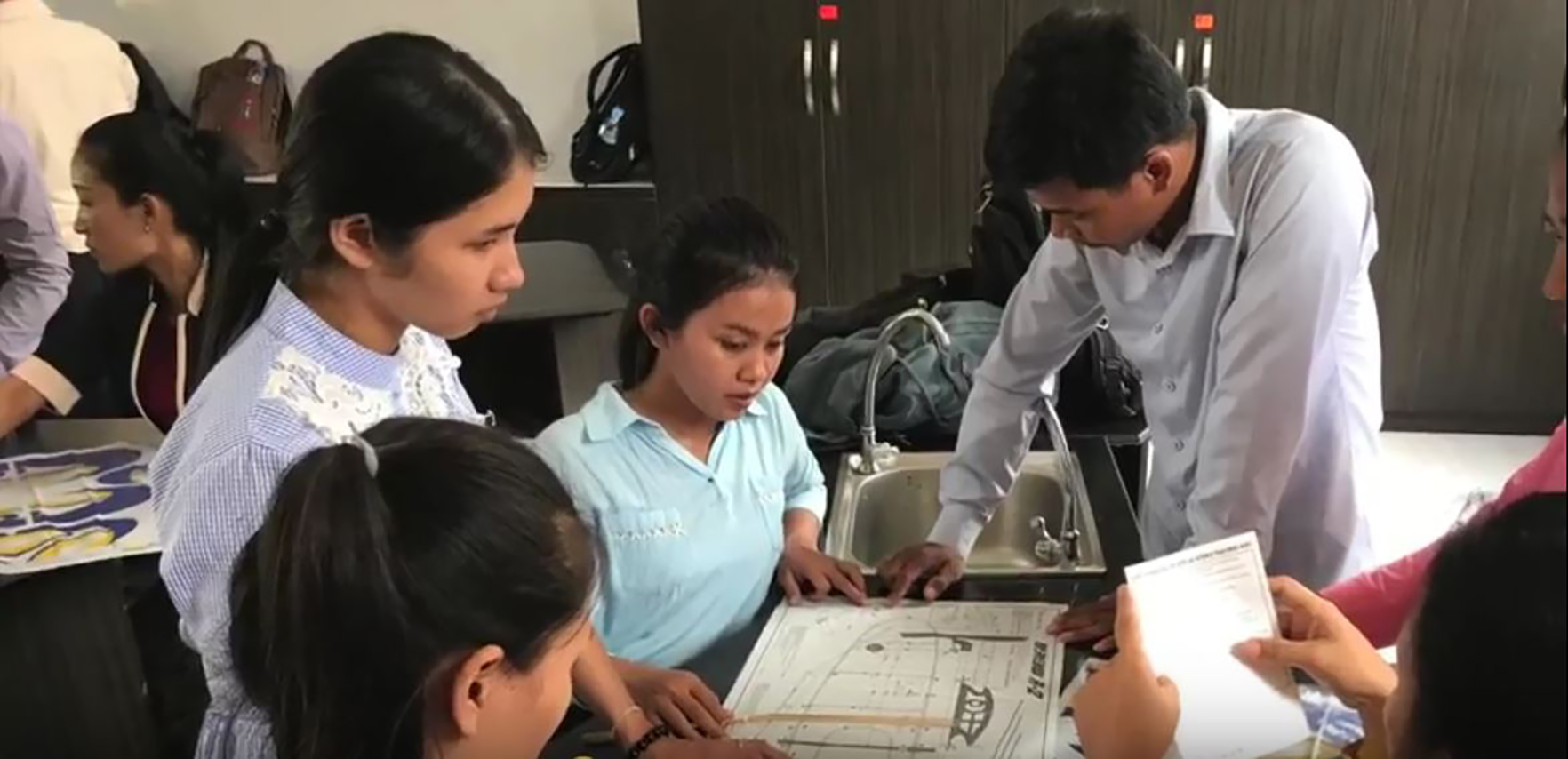 Students working on STEM projects in Cambodia