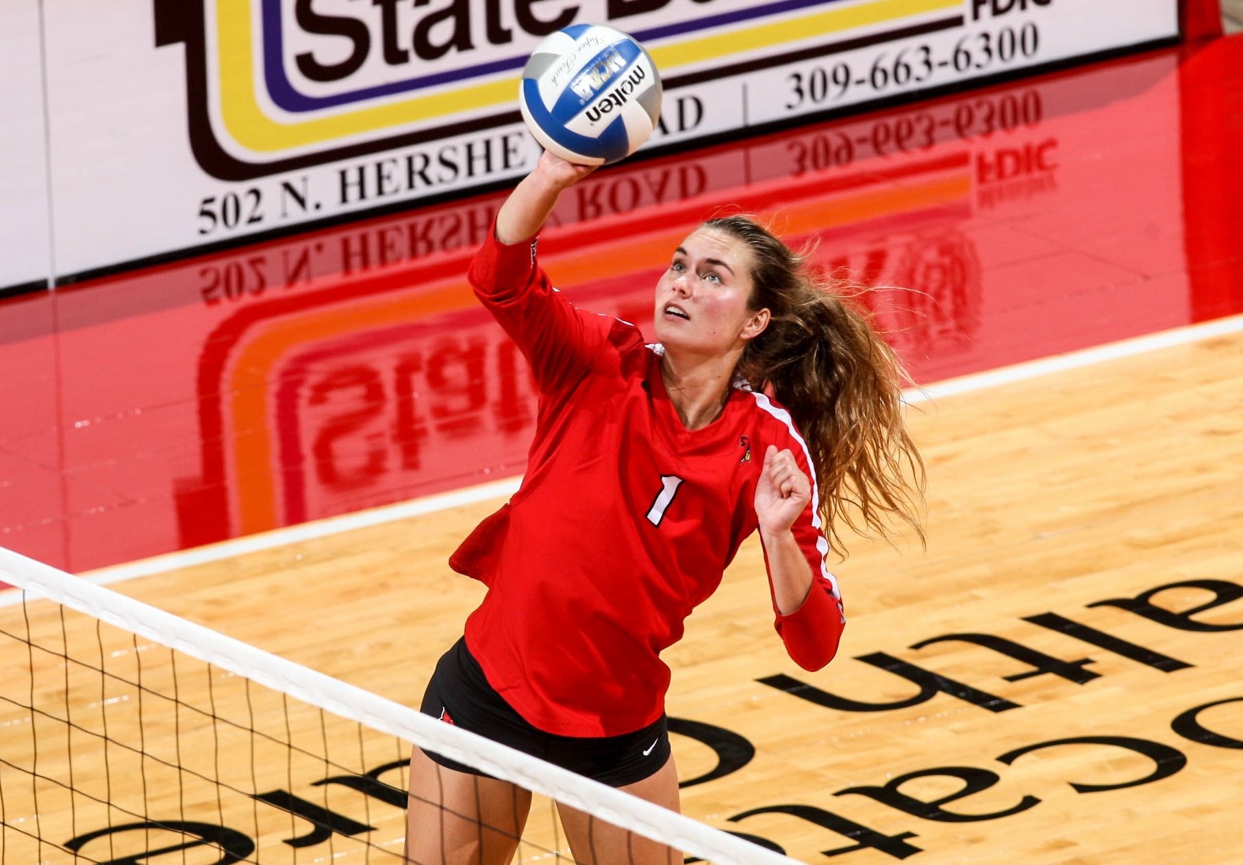 Alison Line, Mennonite College of Nursing student, playing for ISU volleyball.