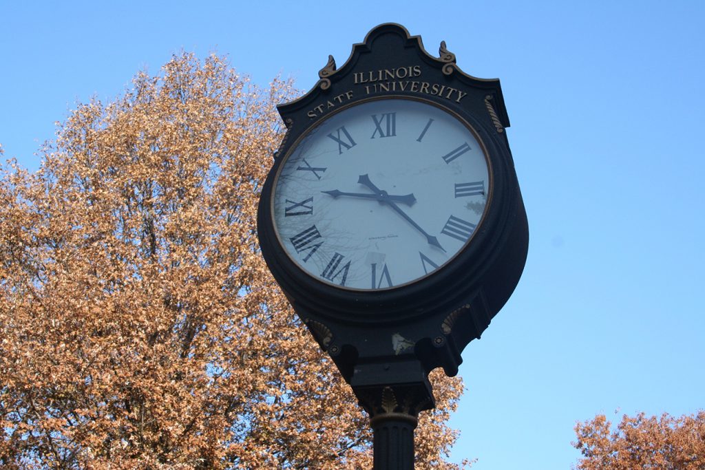 Illinois State University clock on the Quad in the fall
