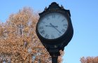 Illinois State University clock on the Quad in the fall