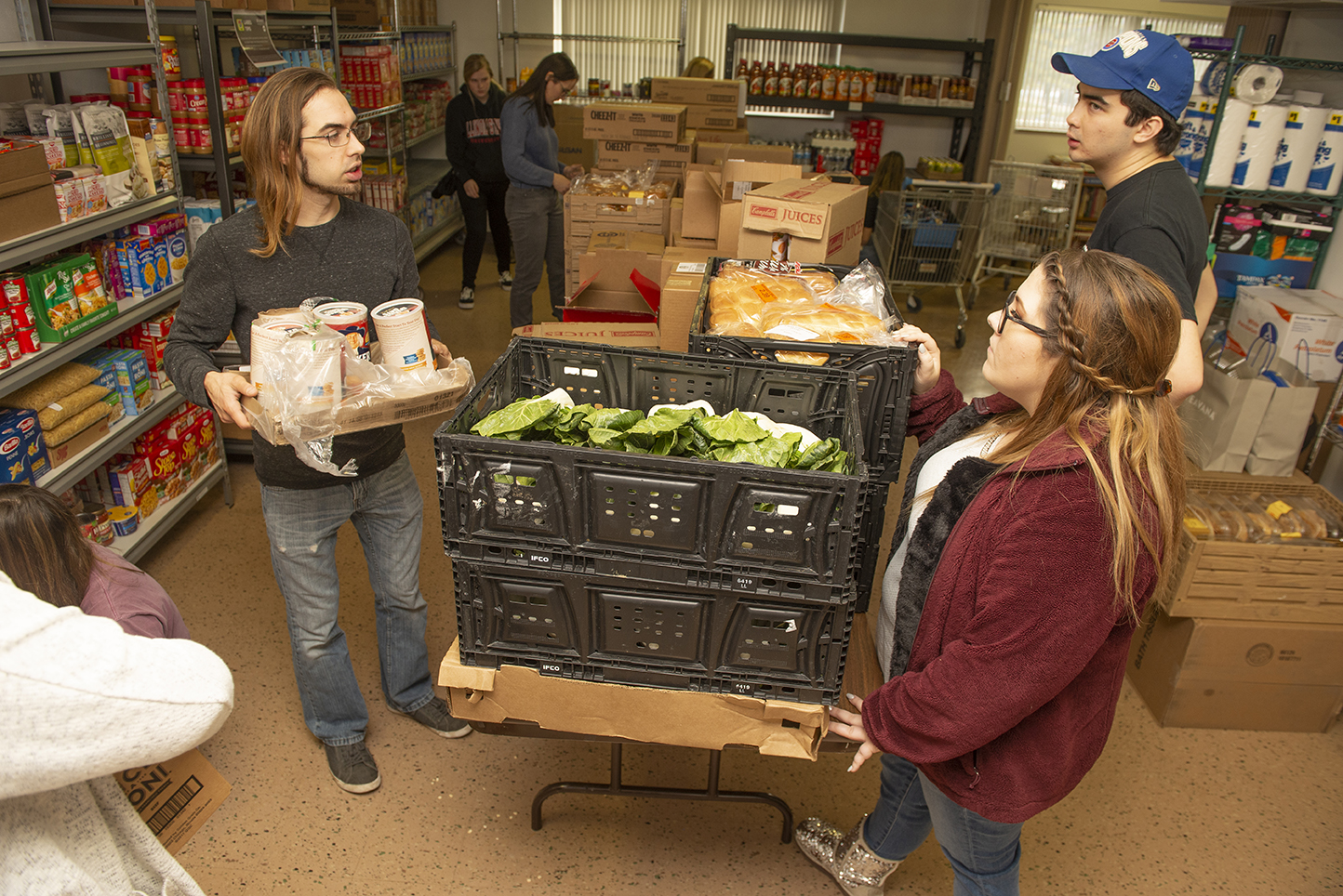 Noah Tang (right) and Jeanna Campbell were among the ISU students who helped start the food pantry.