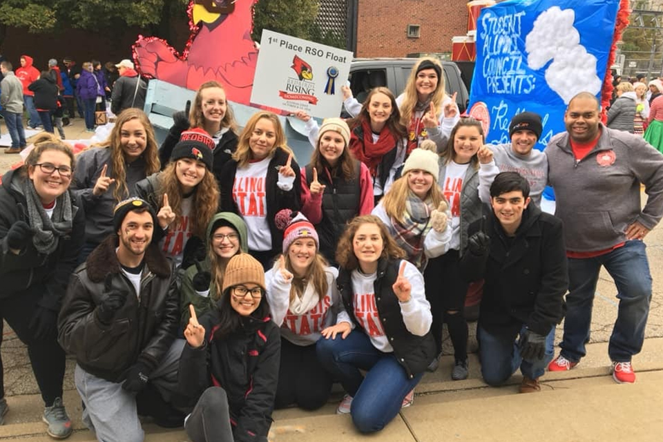 SAC winning the Homecoming 2018 Parade float contest. From left to right: Julia Gramont (graduate advisor), Alissa Kinast (philanthropy chair), Anna Schlotterback (social and Siblings Weekend chair), Jenna Meyers (Homecoming co-chair), Erin Jessup (secretary), Megan Cain (co-president), Valerie Brown (co-president), Alyssa Cattaneo, Andrew Sterr, Richard Greenfield, Alex Smith, Laura Ledin (general council representative and Homecoming co-chair), Lauren May, Sam Matrisciano (alumni engagement officer), Larissa Sheehan, Kat Mraz, Allison Leczycki (business liaison and co-chair), and Cindy Yu.