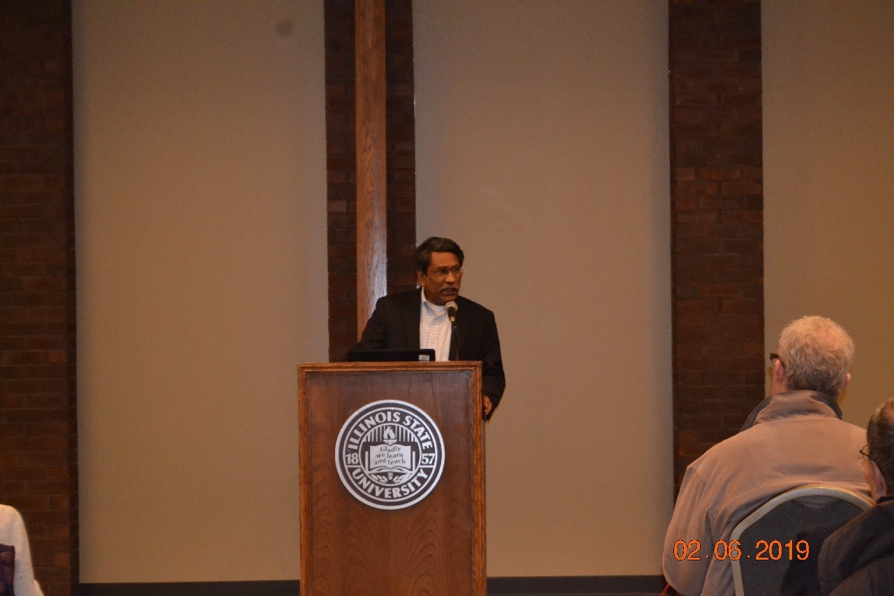 Ali Riaz at the podium giving a lecture