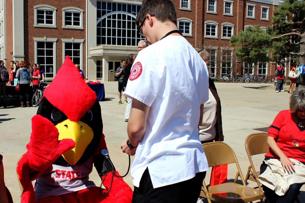 Reggie gets his blood pressure checked at National Walking Day