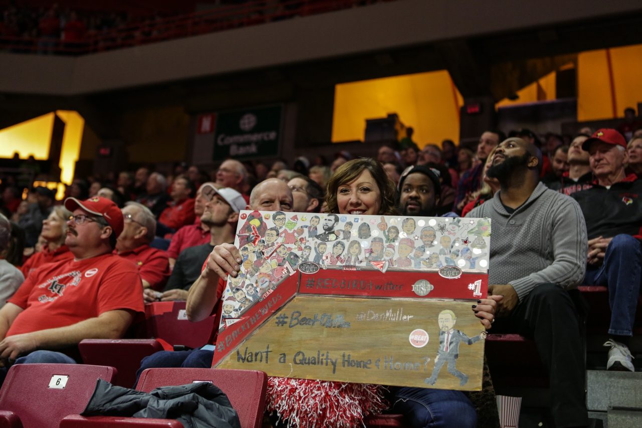 Redbird fan Lisa Moran at a game with one of her signs.