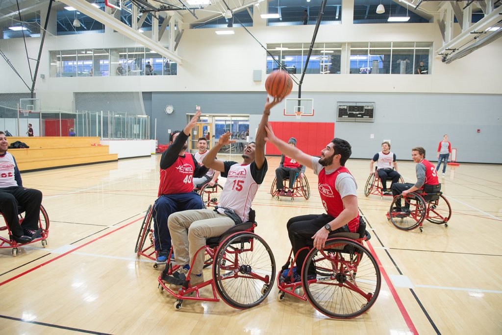 ISU students play wheelchair basketball during the fifth annual Adaptapalooza.