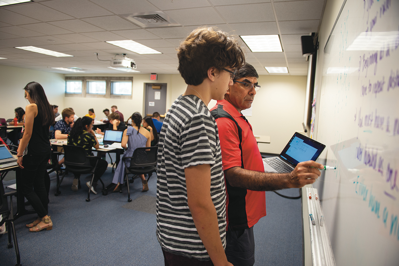 Distinguished Professor Saad El-Zanati introduces math research to Chicago high school students at his summer camp.