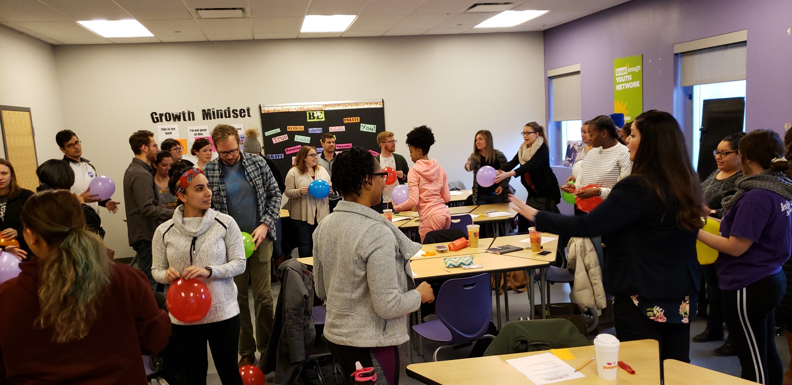 During Carrie Conover’s teacher mood workshop, educators anxiously popped balloons to explain their specific moods and attitudes during the school day.