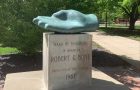 statue of a hand with the words "Hand of Friendship" in honor of Robert G. Bone presented by the class of 1967