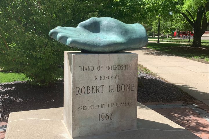 statue of a hand with the words "Hand of Friendship" in honor of Robert G. Bone presented by the class of 1967