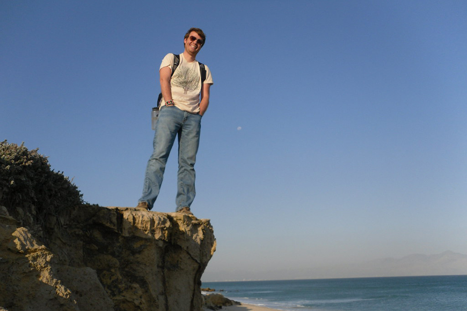 Zac Chase on the shores of Western Cape in South Africa where he led trainings for teachers on educational technologies.