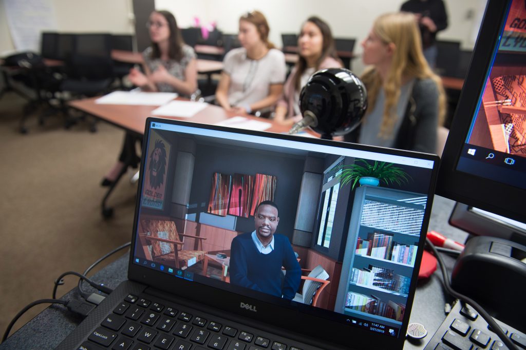 Pre-service teachers speak with a parent avatar during a Virtual Nest simulation.