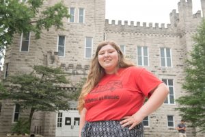 McLean County Full Tuition Scholarship winner Maddie Adelman stands in front of Cook Hall