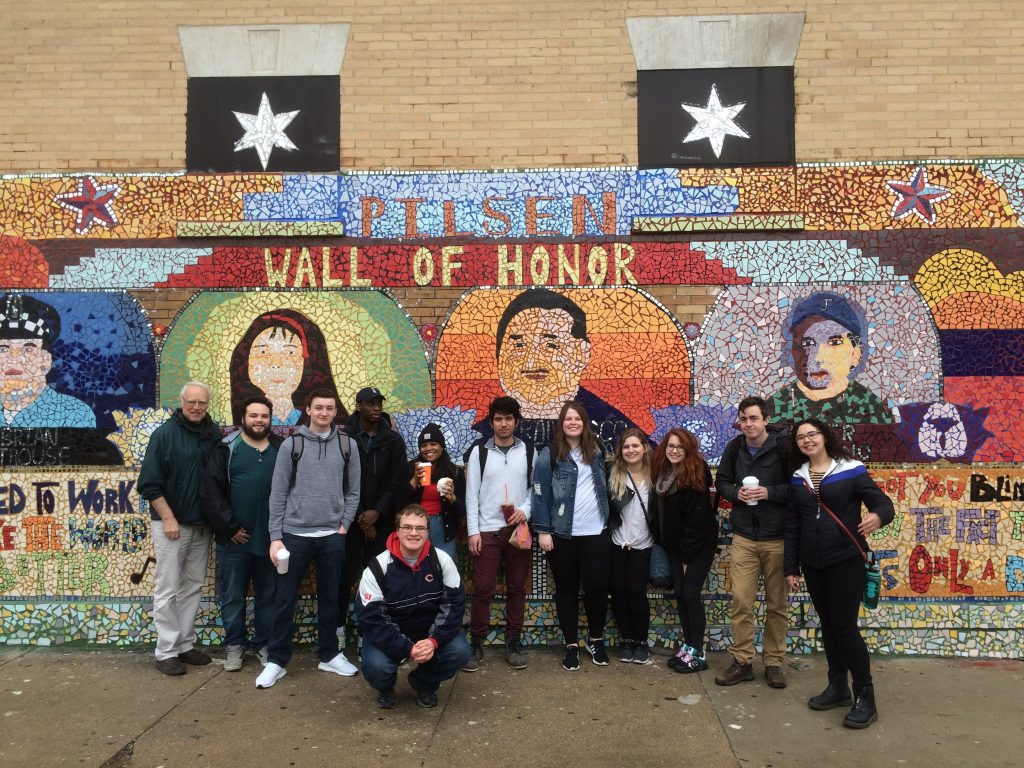 Students in front of a mural in the Pilsen neighborhood of Chicago on the March 2019 Chicago field trip. Jessica Abdelnour is first on the right.