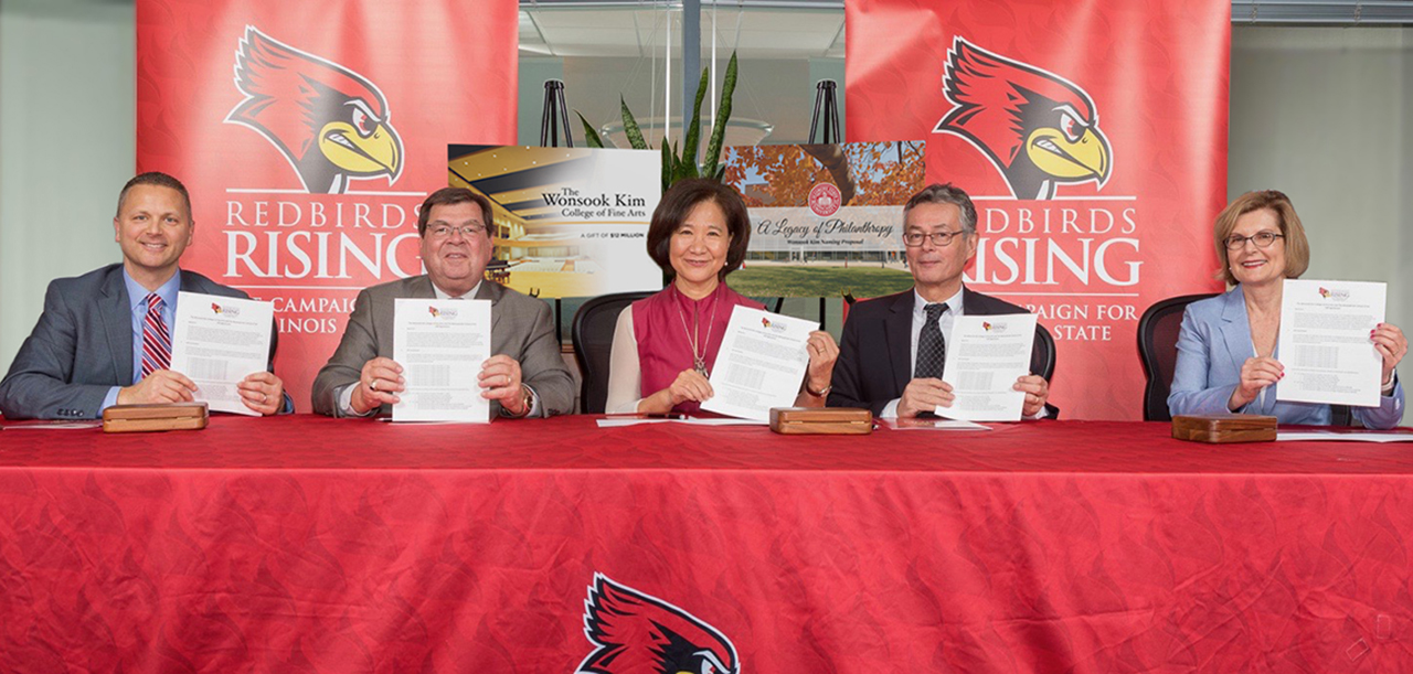 Pat Vickerman, President Larry Dietz, Wonsook Kim, Thomas Clement, and Jean Miller at signing of Kim's and Clement's $12 million gift agreement