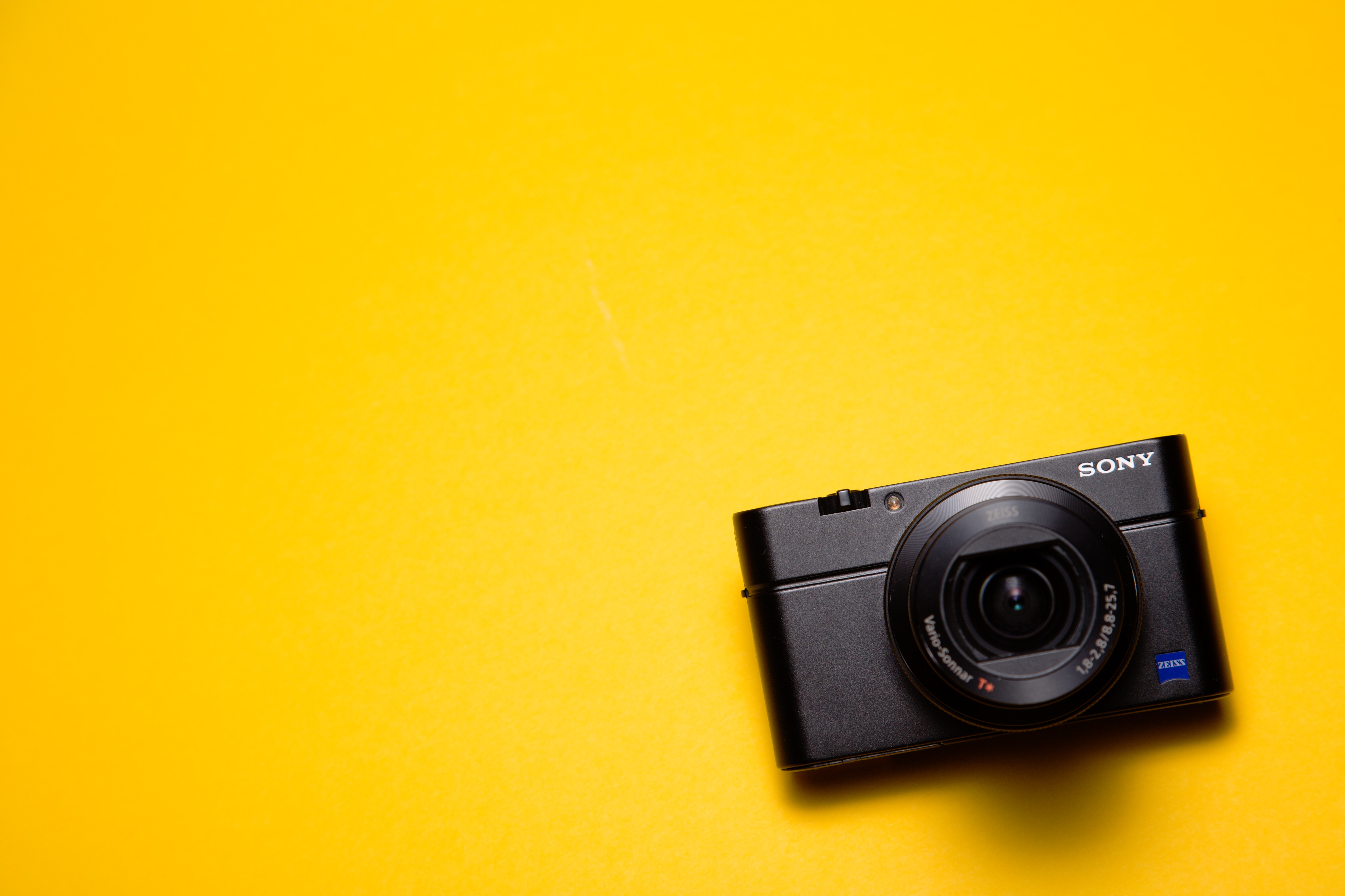 camera on a yellow background