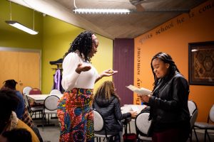 Candice Halbert ’01 answers a question for 2019 Charles STEM Scholarship winner Ciara Newman at Thursday’s STEM Social program in the Vrooman Center