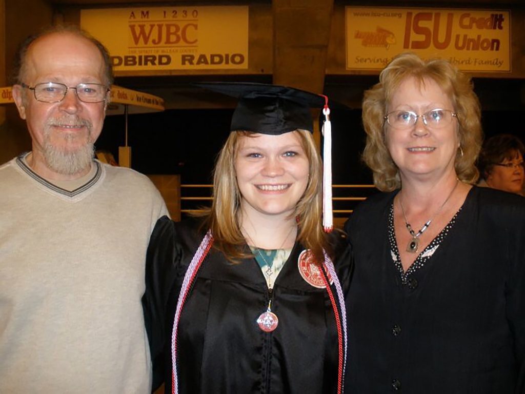 Julia O'Dell with her parents at her ISU graduation.