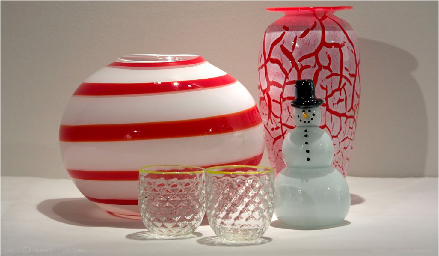 glasses, vases, and a snowman made from glass