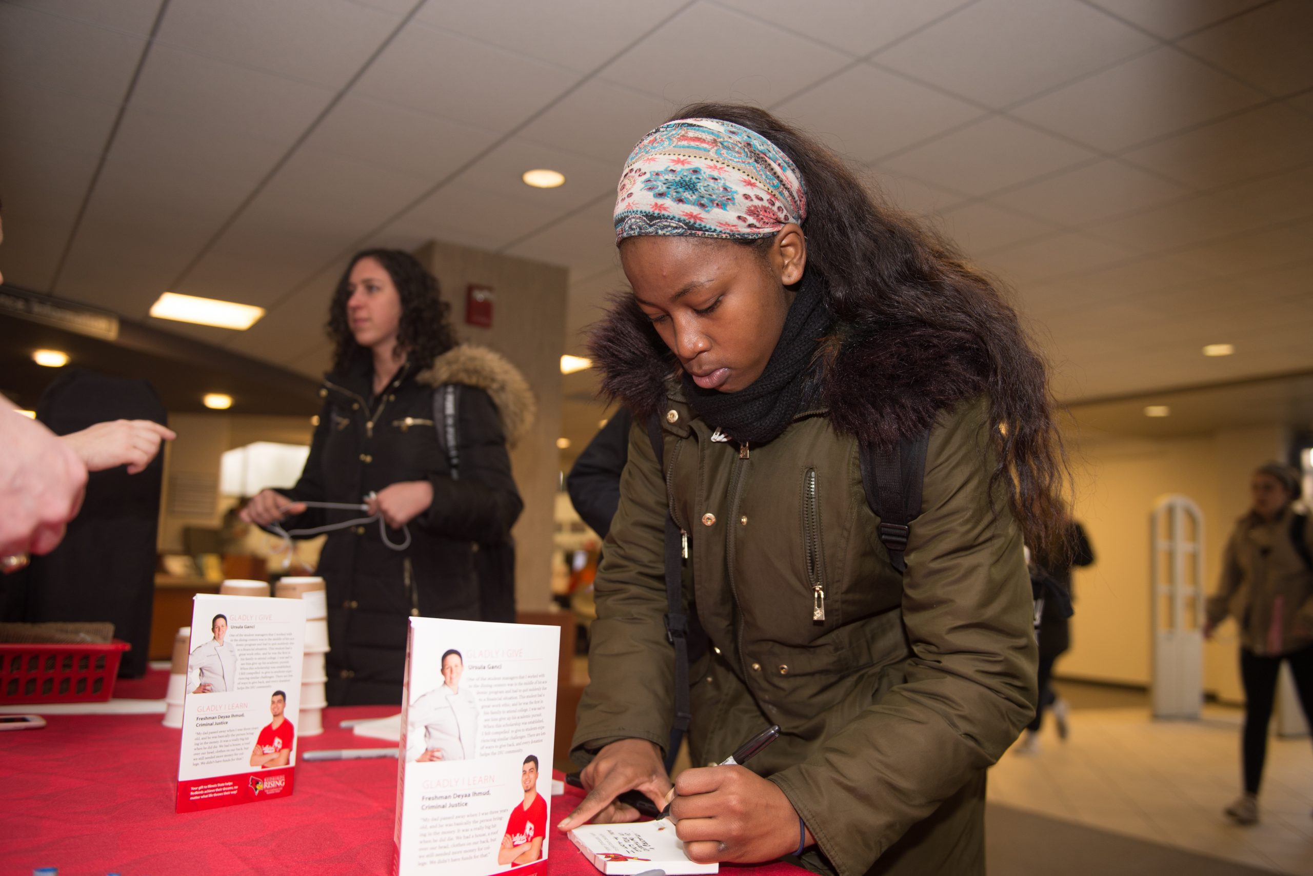 A student writing why she's grateful for Redbird donors during Redbird Philanthropy Week.