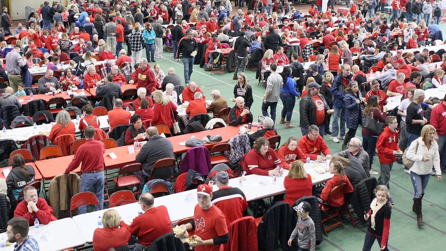 Redbird fans at tables inside Horton Field House