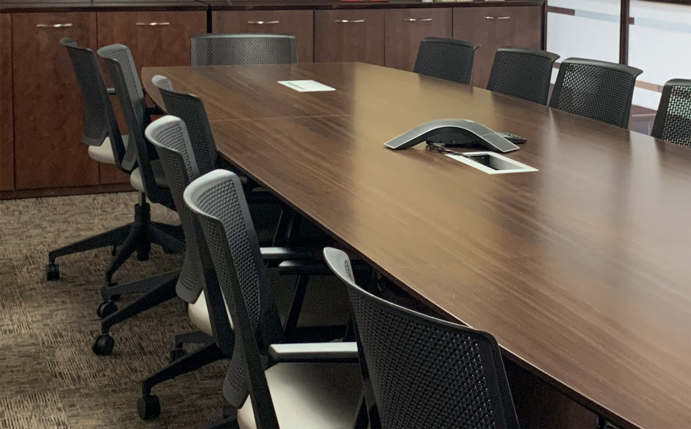image of a table and chairs in meeting room
