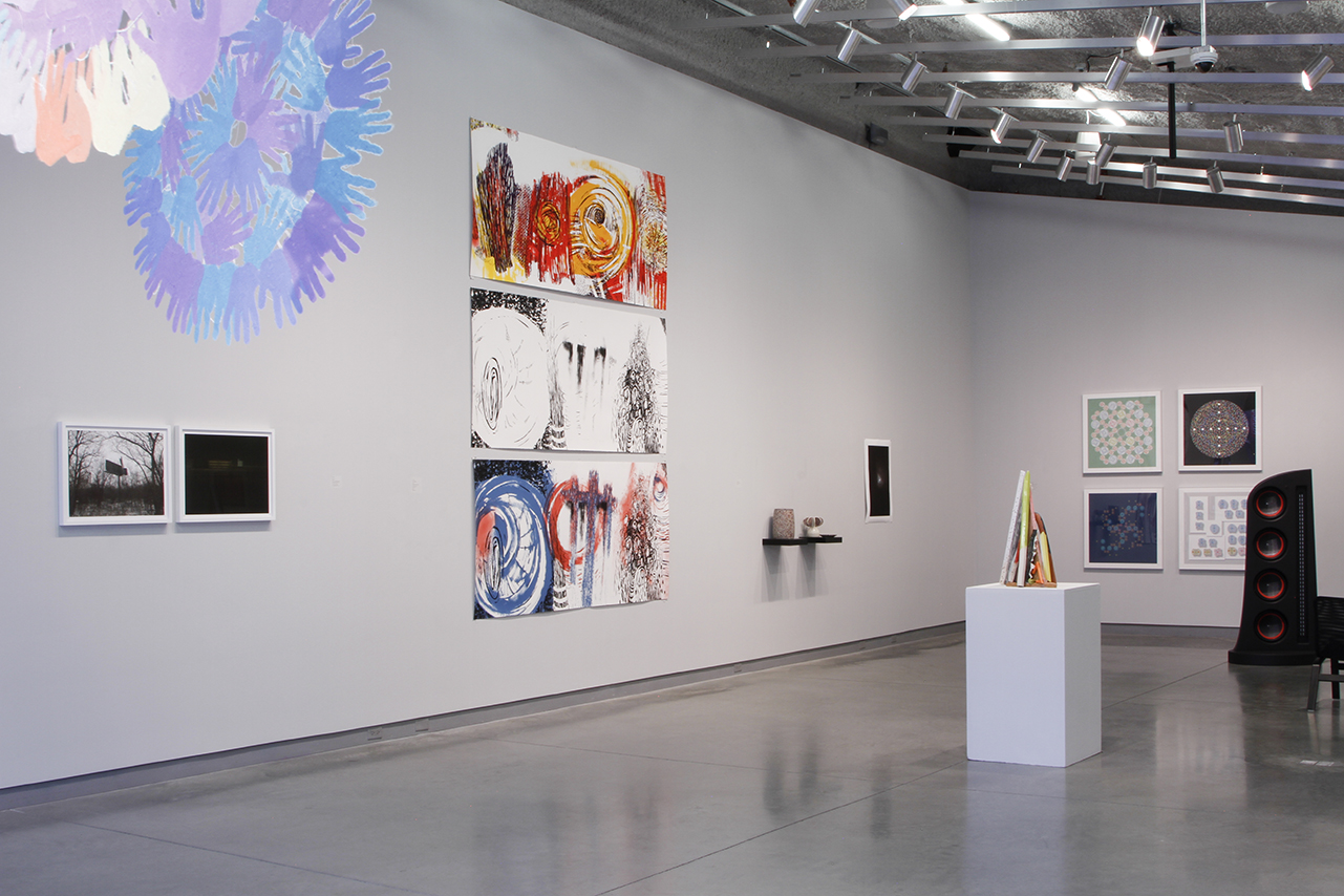 art pieces line the walls and sculpture on pedestals in the galleries