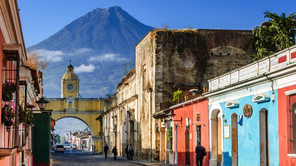 photo in Guatemala showing colonia city and mountain in the background