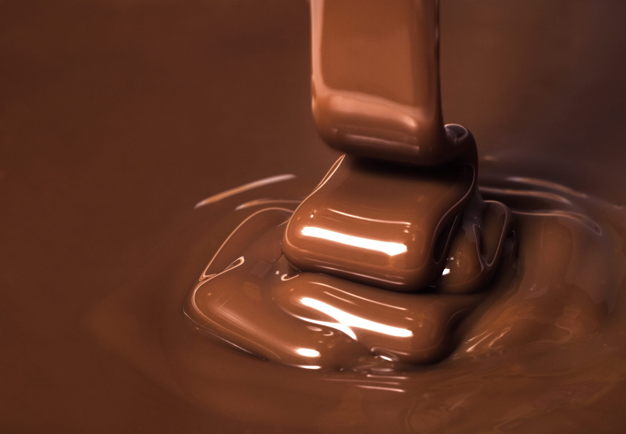 Ribbons of chocolate being poured