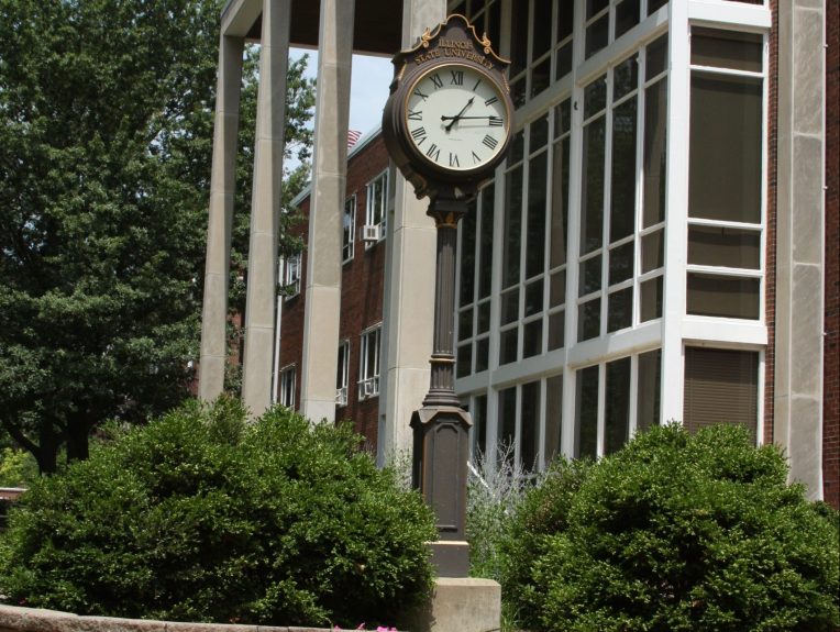 old union building on campus with clock in front
