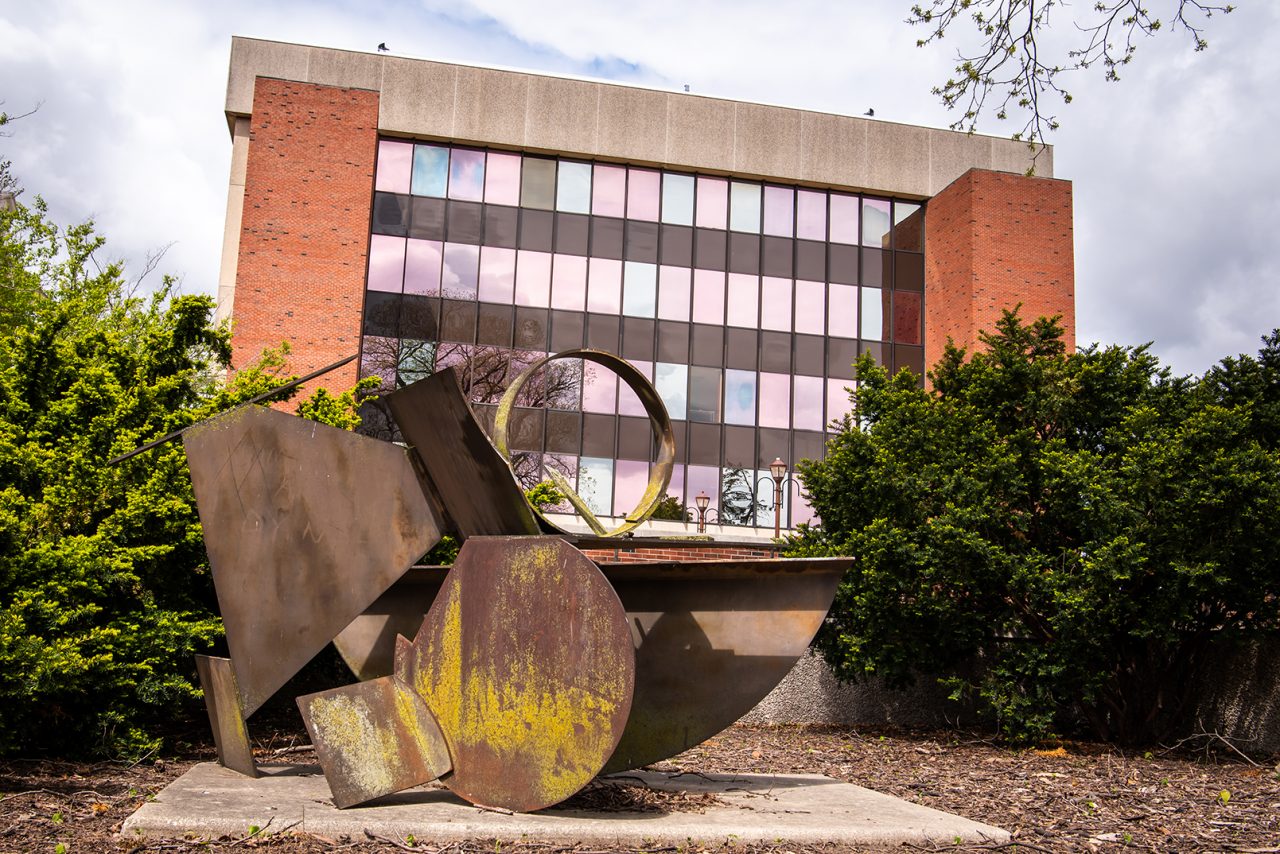 Abstract Variations sculpture by Ernest Trova with DeGarma Hall in the background
