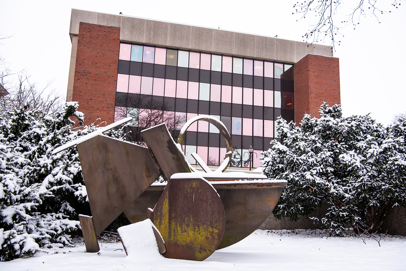 Abstract Variations sculpture by Ernest Trova with DeGarma Hall in the background