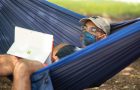 Student studies in hammock