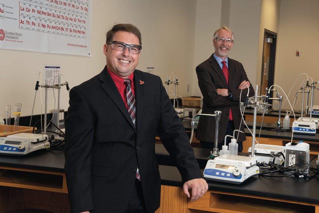 Dr. Craig C. McLauchlan (left) has taken over as associate vice president for Research and Graduate Studies from fellow Department of Chemistry colleague Dr. John Baur.