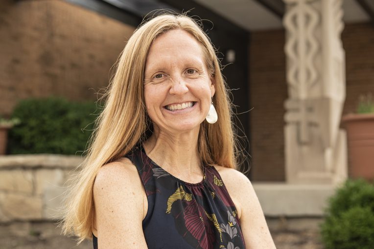 Dr. Katy Strzepek, Ph.D. '18, Director of the Center for Community Engagement and Service Learning, head shot