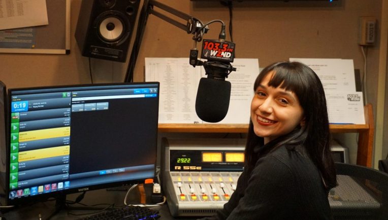 Student in radio station booth
