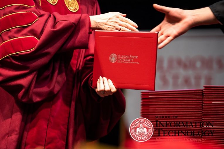 Graduating student receiving diploma