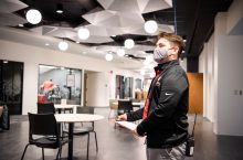 Student stands in the newly renovated Bone Student Center